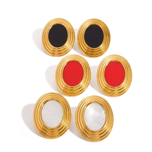 Three pairs of vintage oval gold earrings in black, red, and white pearlescent colors