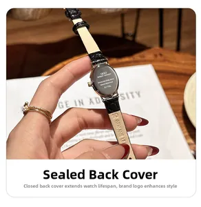 Close-up of the stainless steel caseback and crocodile leather strap of the luxury watch