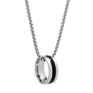 Detail of silver and black stainless steel ring necklace on a clean white background
