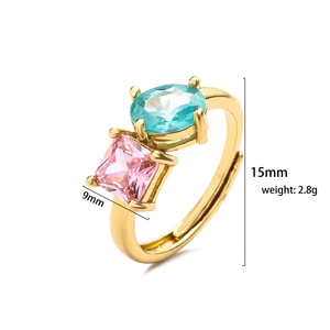 Adjustable gold ring with pink square and light blue oval cubic zirconia stones