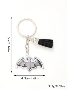 Detail view of acrylic bat keychain with black tassel and measurements in inches and cm