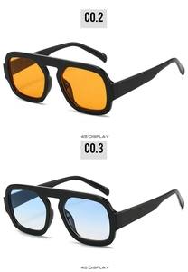 Detail of square pilot sunglasses in orange and blue gradient lenses with thick PC frames