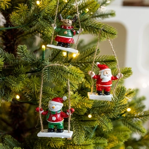Christmas tree ornaments set featuring Santa, Snowman and Reindeer resin figurines