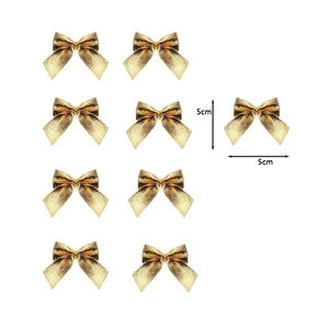 Detailed view of nine gold glitter decorative Christmas bows in a matrix layout
