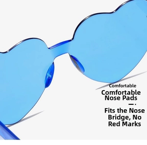 Detail of ergonomic nose pads on blue jelly heart-shaped rimless sunglasses