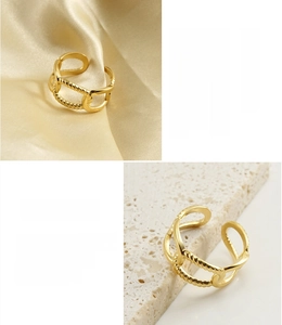 Detailed macro view of an 18k gold plated stainless steel twisted rope texture ring