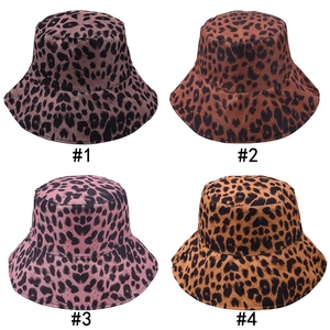 Four leopard print bucket hats in different colors including tan, pink, and brown