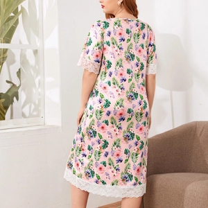 Plus size floral print nightgown with white lace trim and V-neckline in soft pink