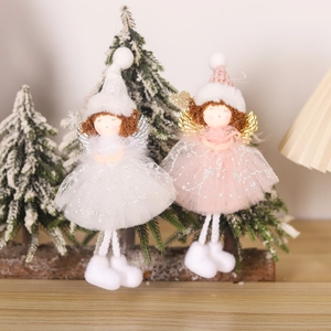 Christmas angel dolls with tulle skirts and knitted hats for festive tree decoration