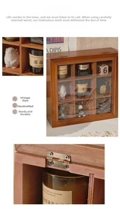 Macro detail of antique wood storage box with metal hinges and nine display compartments