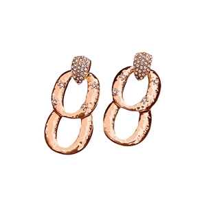 Gold-tone double link earrings with hammered metal texture and sparkling crystals