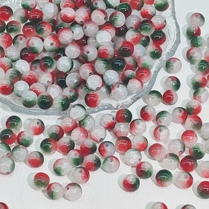 Macro detail of 10mm tricolor crackle glass beads for DIY handmade jewelry crafting