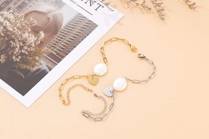 Détails de bracelets chaîne ajustables or et argent avec pendentifs cœur et nacre