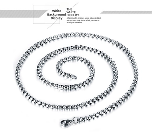 Detailed view of silver stainless steel box chain necklace with a lobster clasp