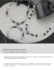 Detailed shot of punk hip hop style stainless steel skull necklace with white pearls