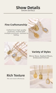 Macro detail of vintage relief rose and moon pendant necklaces in gold finish