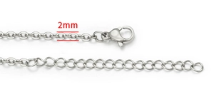 Detail of 2mm silver stainless steel flat cable chain featuring a sturdy lobster clasp