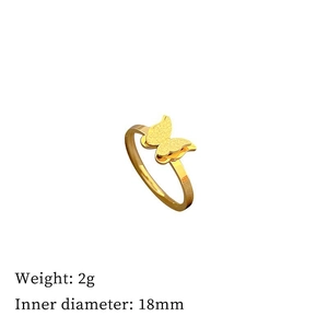 Detail view of golden butterfly ring with 18mm inner diameter and 2g weight specs