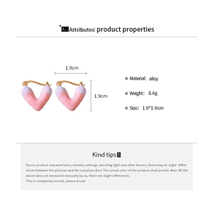 Detailed view of pink and purple gradient enamel heart earrings in alloy with 1.9cm size