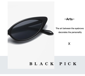 Detailed close-up of retro black cat-eye sunglasses with polished frame and fashion text
