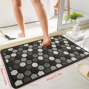 Detail of 50x80cm geometric diatom mud bathroom mat with gray non-slip absorbent texture