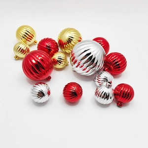 Set of 15 decorative Christmas balls in red gold and silver finish on white background