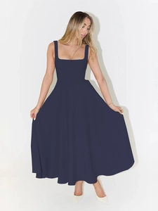 Detail view of navy blue square neck sleeveless dress with an elegant A-line maxi skirt