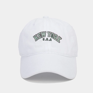 Detail of New York USA embroidery on white cotton twill baseball cap with curved brim