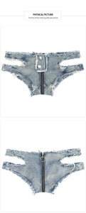 Detail von hellblauen Denim-Hotpants mit seitlichen Ausschnitten und durchgehendem Reißverschluss