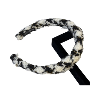 French vintage black and white tweed headband on display stand for women