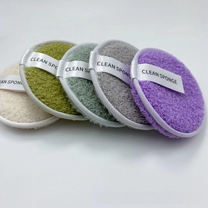 Detailed view of five multi-colored microfiber facial cleansing pads with soft texture