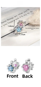 Detail of silver earrings with heart and star zircons including precise size measurements