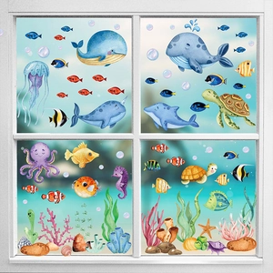 Detailed view of colorful cartoon ocean world stickers applied to a white window frame