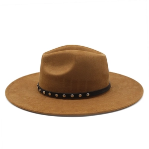 Detail of khaki faux suede fedora hat featuring black leather band with silver metal studs