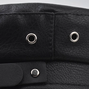 Detail of black PU leather military cap with silver metal eyelets and side buckle
