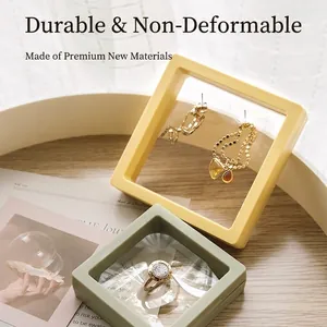 Yellow and green square PE film floating jewelry display boxes for rings and earrings