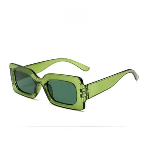 Side view of retro green rectangle sunglasses with thick temples and Y2K aesthetic