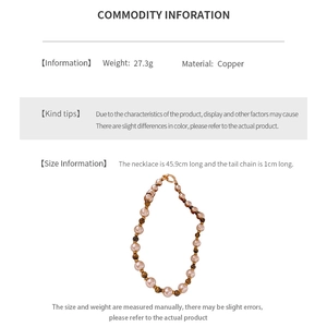 Détails du collier en perles de cuivre : poids 27,3g et longueur 45,9cm style oeil de tigre