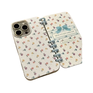 Floral iPhone 16 Pro Max case with blue spiral notebook design and mountain dream print
