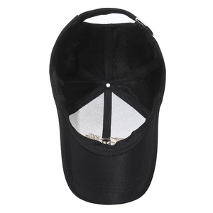 Interior view of black embroidered baseball cap showing reinforced seams and adjustable buckle