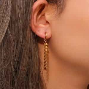 Elegant 18K gold plated stainless steel long leaf tassel earrings on model
