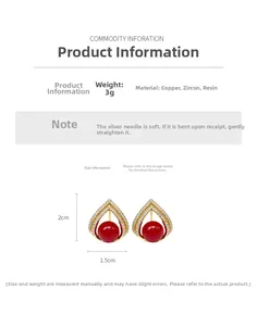 Détails de boucles d'oreilles goutte plaquées or 18 carats avec zircon et résine