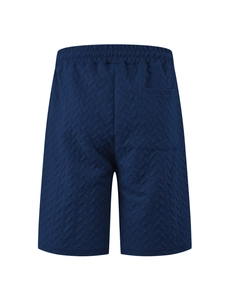 Rear view of navy blue casual shorts showing V-quilted texture and elastic waistband