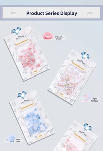 Detailed mixed nail art charms with resin roses and half-round pearls in pastel colors