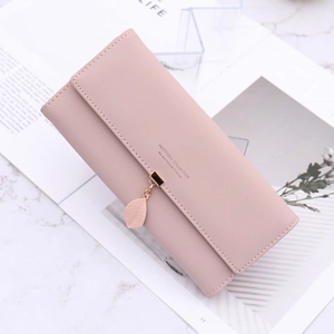 Pink faux leather long wallet for women with leaf pendant and elegant flap closure