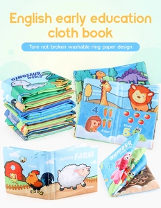 Detail showing tear-resistant soft baby cloth book with crinkle paper for sensory play