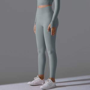 Detail view of seamless grey yoga set featuring thumb hole cuffs and high waist leggings
