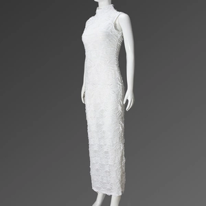 Close-up of white high-stretch sleeveless dress featuring unique fringe texture and slim fit