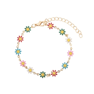 Elegant gold-tone chain bracelet with colorful enamel daisy flowers and lobster clasp