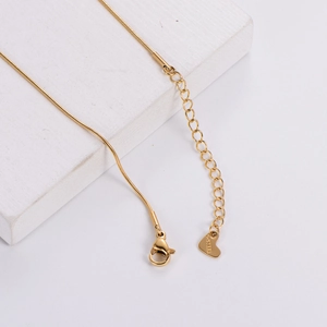Golden stainless steel double-layered butterfly necklace with snake chain and heart charm